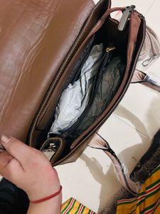 brown medium handbag 👜