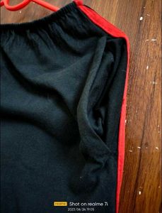 Black Track Pants with Red Stripe