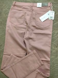 Peach Ankle Length Slim Fit Jeans .