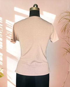 Pink shimmer top with ruching details on the waist