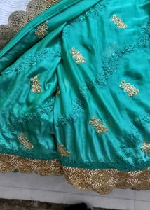 Elegant Teal Embroidered Saree