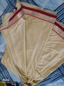 pretty red golden saree.