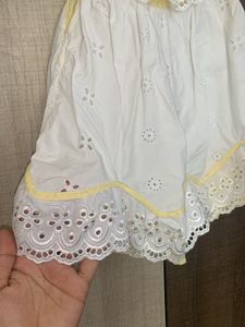 Cute White-yellow Frock With Pace Detailing