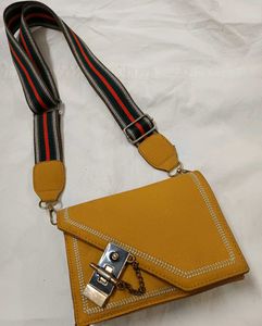 Stylish yellow leather crossbody bag