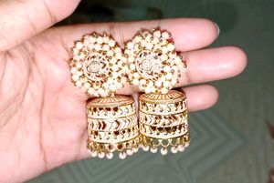 Earrings.     Buy 1 Get  One Free