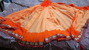 Classicate Orange Embroidered Chiffon Saree