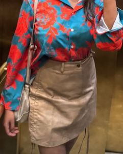 Short Gorgeous Ruched Leather Skirt On The Sides