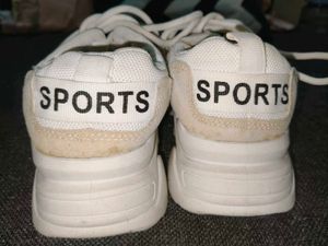 Vintage-Style Off-White Sneakers