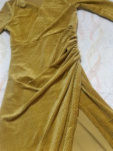 Turn Heads in Our Mustard Velvet Bodycon Dress.
