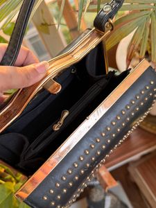 Black embellished sling bag