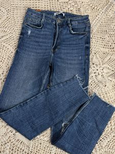 Ripped Knee Denim Jeans