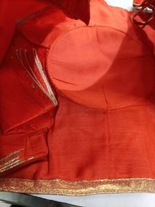 Orange Colour Blouse With Sleeves Inside...