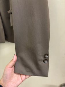 COMMA’ SLIQUE BOW-DETAILED BLAZER