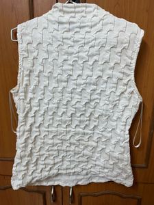 Textured Sleeveless Mock Neck Top