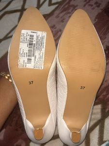 Iconic White Ballerinas