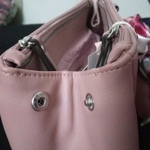 Chic Pink Handbag with Floral Scarf