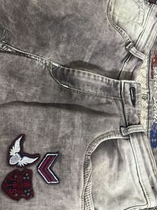 Grease Denim Distressed Jeans