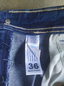 Ripped Blue Denim Jeans