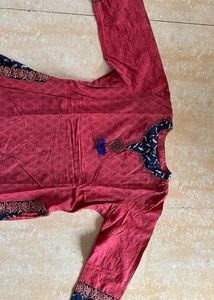 A light Festive Red Kurta Plazo Set
