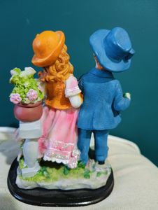 CUTE COUPLE SHOWPIECE. MADE OF STONE AND PLASTIC