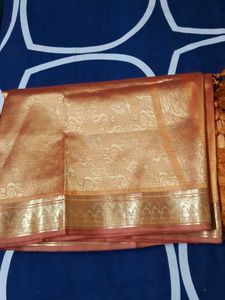 It Is Beautiful Mango Color Silk Saree.