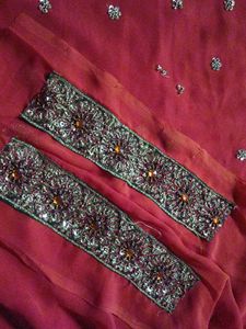A Rust Colour Dress Material.
