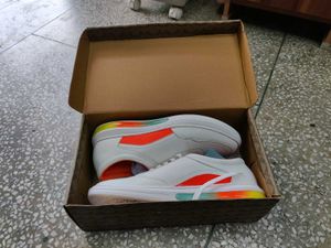 White &amp; Orange Accent Sneakers