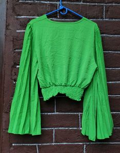 Bright green crop top.
