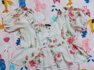 SASSAFRAS Floral Peplum Top