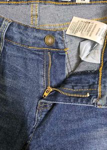 Distressed Denim Jeans