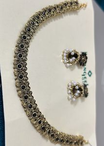 Black With Gold Neck Piece And Matching Jhumka