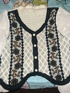 I Am Selling A Top With Floral Desing