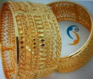 Ornate Gold-Tone Bangle Bracelet