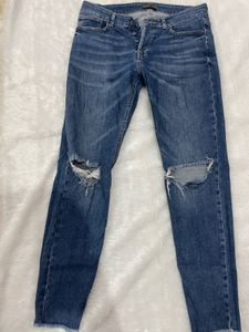 ZARA Ripped Knee Jeans