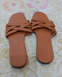 Stylish Orange Criss-Cross Slides