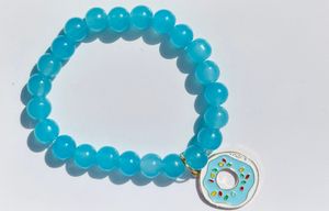 Light Blue Glass Beads Bracelet With Hanging Charm.