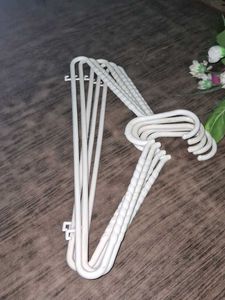 Set of 5 White Plastic Hangers