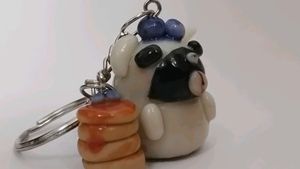 Cute zebra striped pug and pancake keychain
