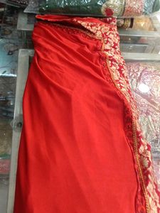 Elegant Red Saree with Gold Embroidery