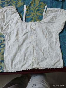 A beautiful white crochet top