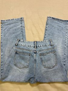 Distressed Wide Leg Denim Jeans