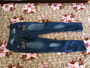 Distressed Denim Jeans