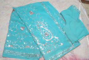 Sea green party wear sequence saree