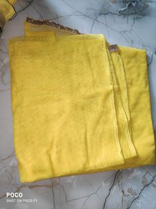 yellow net suit.