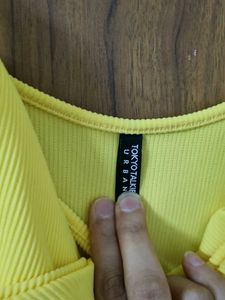 Yellow Sleeveless Dress with Open Back