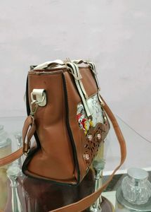 Floral-Accented Brown Satchel