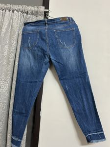 Distressed Denim Jeans