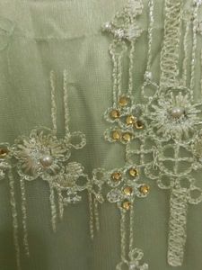 It Is A Beautiful Green Mini Gown