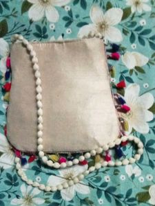 Embroidered Sling Bag