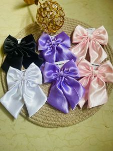 Branded Tail Bow Clips